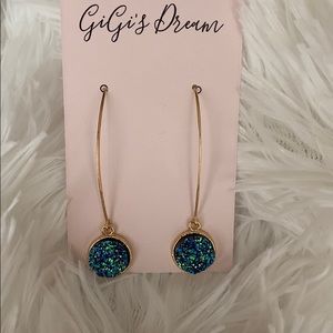 2/$20 Gold Tone Blue Iridescent Earrings